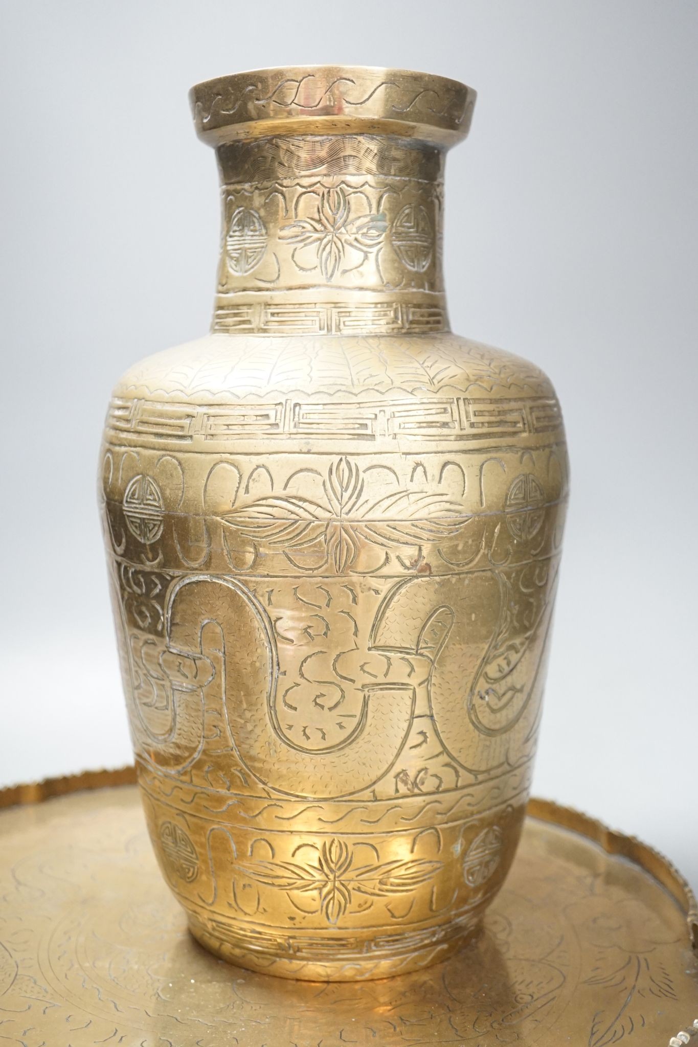 Two early 20th century Chinese bronze vases and a similar tray, 35cm diam.